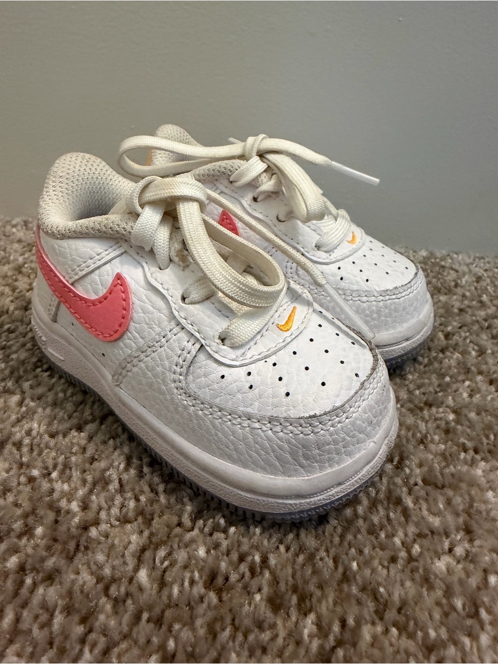 Nike Kids White Leather Sneakers with Pink and Yellow Accent